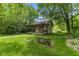 A charming outbuilding has a porch area, perfect for storage or as a unique guest space at 4131 N County Road 500 E, Danville, IN 46122