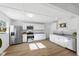 Modern kitchen with stainless steel appliances, sleek countertops, and ample cabinet space at 453 Carol Dr, Greenwood, IN 46143