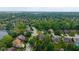 Neighborhood aerial view showcases lush landscaping and proximity to 116th & Hazel Dell Pkwy at 5208 Clear Lake Ct, Carmel, IN 46033