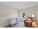 Bedroom with a crib, chair and natural light from the window at 5208 Clear Lake Ct, Carmel, IN 46033
