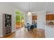 Bright dining area with sliding glass door to the deck, seating for four and built in storage at 5208 Clear Lake Ct, Carmel, IN 46033