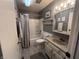 Cozy bathroom featuring vanity storage, a shower-tub combo, and a classic color scheme with ample light at 6632 Sargent Rd, Indianapolis, IN 46256