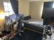 Bedroom featuring a large window, a bed, and a desk with multiple monitors creating an ideal gaming space at 6632 Sargent Rd, Indianapolis, IN 46256