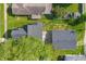 Bird's-eye view of the house showcasing the roof, yard, and proximity to neighboring homes at 806 S 17Th St, Elwood, IN 46036
