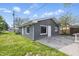 View of back and side yard, with detached garage and grassy areas at 806 S 17Th St, Elwood, IN 46036