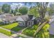 Charming home with well-manicured lawn, mature trees, and a welcoming front porch showcasing curb appeal at 806 S 17Th St, Elwood, IN 46036