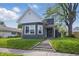 Charming front of home with a well-manicured lawn and entry steps at 806 S 17Th St, Elwood, IN 46036