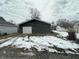 Detached garage is perfect for parking or additional storage at 806 S 17Th St, Elwood, IN 46036