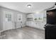 Renovated kitchen with white cabinets, modern countertops, and updated appliances at 806 S 17Th St, Elwood, IN 46036