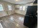 Well-lit kitchen featuring white cabinets, modern countertops, and updated appliances at 806 S 17Th St, Elwood, IN 46036