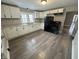 Updated kitchen featuring white cabinetry, granite counters, and stainless steel appliances at 806 S 17Th St, Elwood, IN 46036