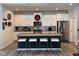 Stylish kitchen island with seating and modern pendant lighting at 9101 S Stone Trace S Blvd, Avon, IN 46123
