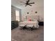 Spacious main bedroom with a large bed, neutral tones, carpeted floor and stylish bedside furniture at 9101 S Stone Trace S Blvd, Avon, IN 46123
