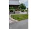 Relaxing outdoor patio area with a gazebo, seating, and view of the pond with a fountain at 9101 S Stone Trace S Blvd, Avon, IN 46123