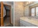Bathroom with sink, medicine cabinet, and shower over tub combo at 1156 Canterbury N Sq, Indianapolis, IN 46260