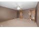 Neutral carpeted bedroom with standard ceiling fan and plenty of natural light at 1156 Canterbury N Sq, Indianapolis, IN 46260
