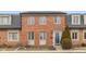 Charming brick townhouse featuring multiple windows and a well-maintained front yard at 1156 Canterbury N Sq, Indianapolis, IN 46260