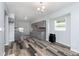 Open-concept kitchen with wooden floor, granite countertops, and ample space at 117 W 36Th St, Indianapolis, IN 46208