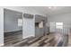 Renovated kitchen features ample grey cabinetry and new wood-look flooring throughout at 117 W 36Th St, Indianapolis, IN 46208