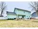 The backyard features a patio, trimmed bushes, hot tub and light green siding at 11710 E 75Th St, Indianapolis, IN 46236