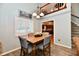 Charming dining area with natural light and a view into the kitchen at 11710 E 75Th St, Indianapolis, IN 46236