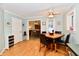Charming eat-in kitchen boasts a dining table and views to the formal dining room at 11710 E 75Th St, Indianapolis, IN 46236