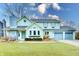Charming two-story home with attached two-car garage and beautifully maintained lawn at 11710 E 75Th St, Indianapolis, IN 46236