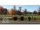 Scenic view of a golf course with fall foliage and well-maintained greens and fairways at 11710 E 75Th St, Indianapolis, IN 46236