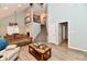 Open-concept living space with a staircase and inviting decor at 11710 E 75Th St, Indianapolis, IN 46236