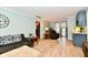 Cozy living room with a view of the adjacent breakfast bar and a backyard view at 11710 E 75Th St, Indianapolis, IN 46236