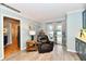 Relaxing living room with French doors and a leather recliner at 11710 E 75Th St, Indianapolis, IN 46236