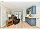 Bright living room with an adjacent breakfast bar and patio access at 11710 E 75Th St, Indianapolis, IN 46236