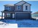 Charming two-story home featuring gray siding and a spacious two-car garage, perfect for modern living at 3251 W Keepsake Ln, Monrovia, IN 46157