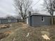 Backyard view of detached garages and a paver walkway at 3314 S Parker Ave, Indianapolis, IN 46237