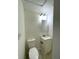 Cozy bathroom with sink, toilet, medicine cabinet, and updated fixtures at 3314 S Parker Ave, Indianapolis, IN 46237