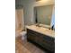 Bathroom featuring a double sink vanity with light countertops and a shower/tub combination at , Whitestown, IN 46075