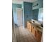 Well lit bathroom with light wood double sink vanity and large mirror at , Whitestown, IN 46075