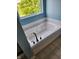 Bathroom showcasing a luxurious soaking tub with jets and dark fixtures at , Whitestown, IN 46075
