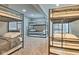 Spacious bedroom featuring multiple bunk beds, providing ample sleeping space in a bright and airy setting at 4030 W 193Rd St, Westfield, IN 46074