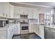 Updated kitchen featuring white cabinets, subway tile backsplash, and stainless steel appliances at 4030 W 193Rd St, Westfield, IN 46074