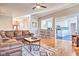 Bright living room features hardwood floors, comfortable sectional seating, and an opening to the kitchen at 4030 W 193Rd St, Westfield, IN 46074