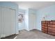 This bedroom features two closets, carpet flooring, and ample natural light at 5053 Manker St, Indianapolis, IN 46227