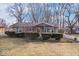Well-maintained single-story home with beautiful curb appeal and mature landscaping at 5053 Manker St, Indianapolis, IN 46227