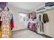 Spacious walk-in closet with built-in shelving for storage at 5053 Manker St, Indianapolis, IN 46227