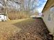 Overlooking the fenced backyard and exterior storage shed in a home at 5430 Milhouse Rd, Indianapolis, IN 46221