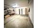 Spacious garage with ample storage and a clean, functional layout for vehicles and projects at 5430 Milhouse Rd, Indianapolis, IN 46221
