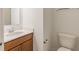 Bathroom featuring vanity, white countertop, toilet, and brushed-nickel hardware at 567 Hidden Hills Dr, Pittsboro, IN 46167