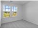 Bedroom with bright windows, plush carpeting, and freshly painted neutral walls, ready to make your own at 567 Hidden Hills Dr, Pittsboro, IN 46167