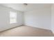 Bright bedroom with carpeted floor, large window, and natural light at 567 Hidden Hills Dr, Pittsboro, IN 46167