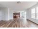 Open layout showcasing a living room leading to a modern kitchen at 567 Hidden Hills Dr, Pittsboro, IN 46167